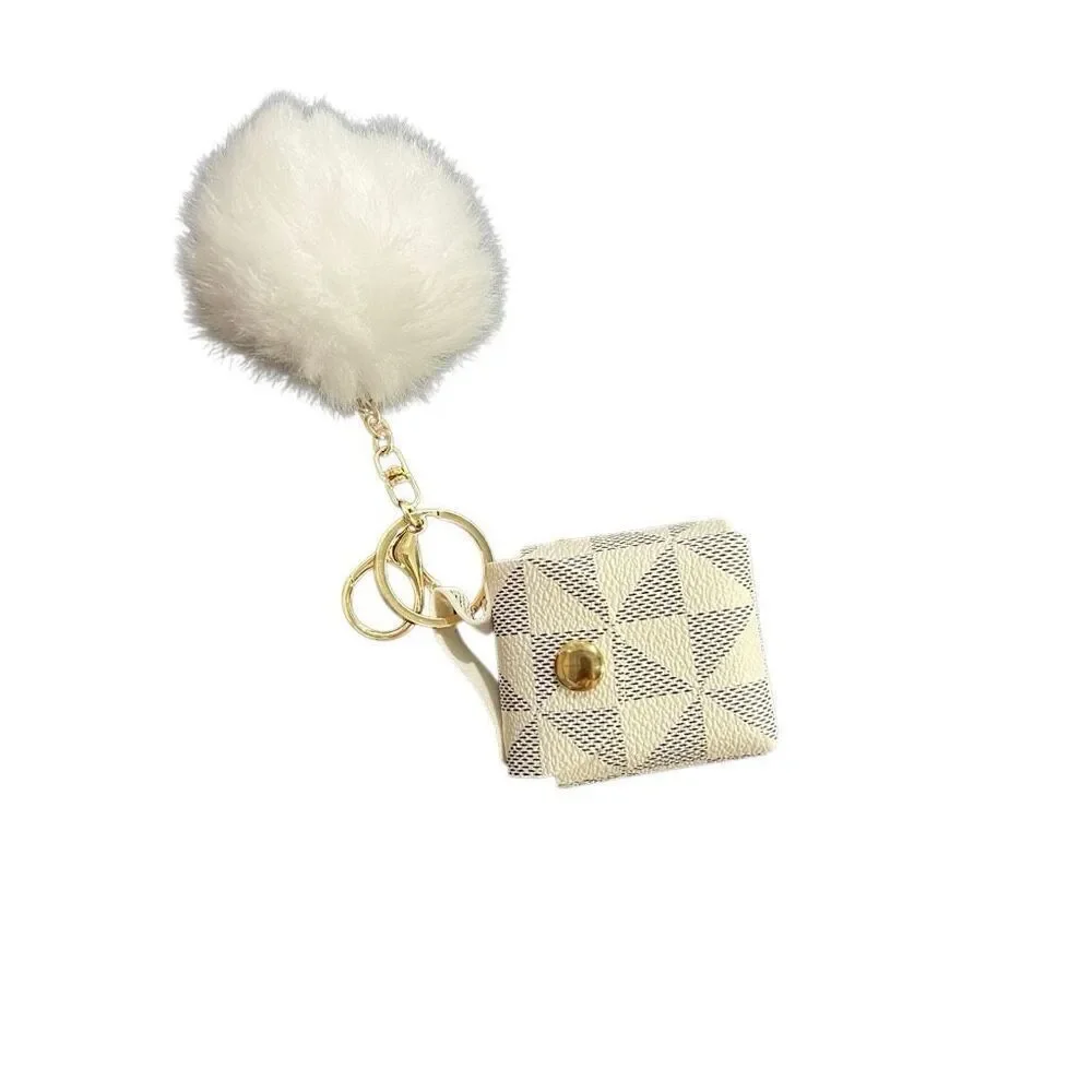 Clip on Keychain Pouch with white Pom Split check mini bag charm snap button gol